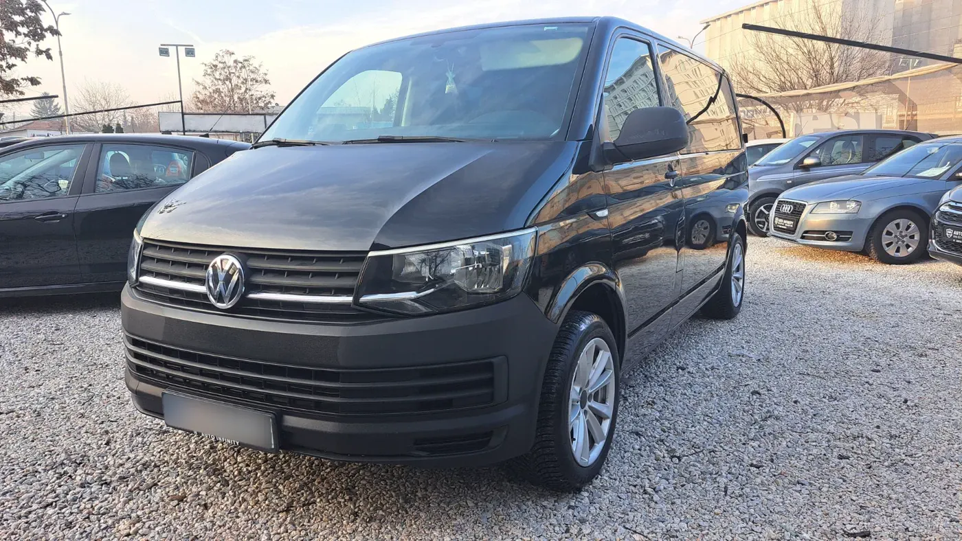 Black Volkswagen Caravelle rental van in Skopje